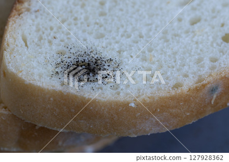 Mold on white bread close up Mold on white bread close up 127928362