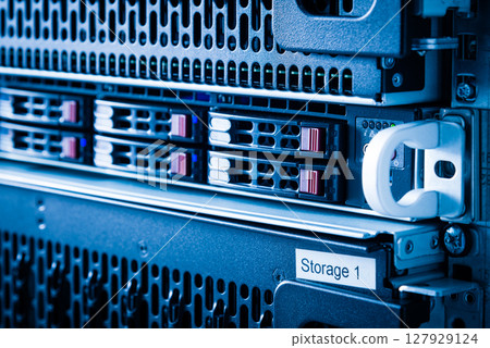 Array of data storage hard drives in internet data center 127929124
