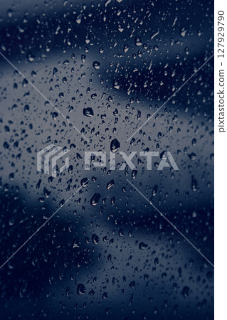 Raindrops on the car window Raindrops on the car window 127929790