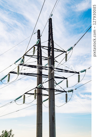 Power lines supplying electricity in Crimea under cloudy sky Power lines supplying electricity in Crimea under cloudy sky 127930085