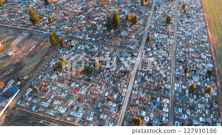 Large cemetery seen from above with colorful tombstones covering the ground 127930186