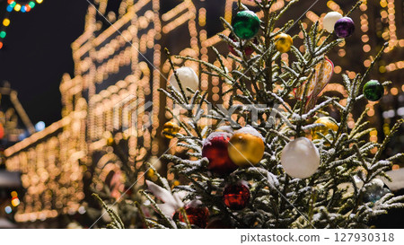 Christmas tree with colorful balls and snow celebrating christmas in Red Square, Moscow 127930318