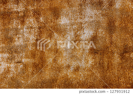 Rusty metal surface in industrial outdoor setting during daytime Rusty metal surface in industrial outdoor setting during daytime 127931912