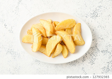 french fries on a plate 127932365