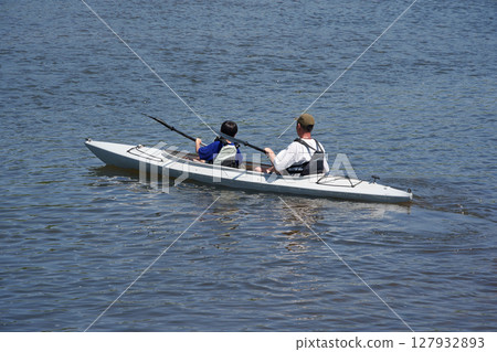 Two-seater river kayak: Parent and child river fun 127932893