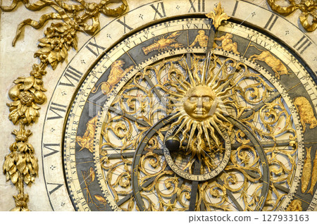 Huge antique clock and astrological calendar with dial and zodiac signs. Horizontal photo Huge antique clock and astrological calendar with dial and zodiac signs. Horizontal photo 127933163