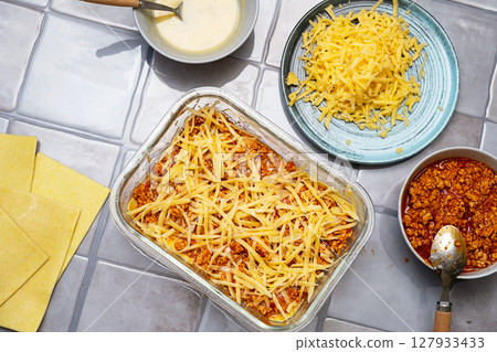 Lasagna Preparation Process. Cooking Homemade Delicious Italian Meal. Food Ingredients Layout. Lasagna Preparation Process. Cooking Homemade Delicious Italian Meal. Food Ingredients Layout. 127933433