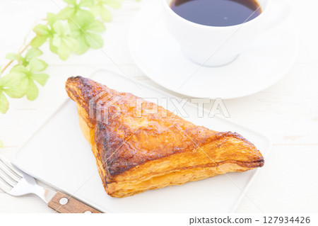A delicious lemon pie and hot coffee breakfast A delicious lemon pie and hot coffee breakfast 127934426
