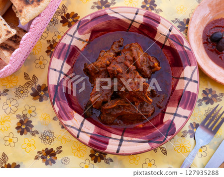 Dish of Tunisian cuisine is tajine. Baked lamb meat cooked in fragrant gravy with vegetables 127935288