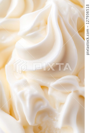 Ice cream texture close up showing intricate patterns, ideal as dessert background 127936518