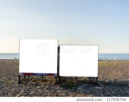 Mockup on the beach. Notice on the changing cabin. Resort mockup. Empty space for bid pictures Mockup on the beach. Notice on the changing cabin. Resort mockup. Empty space for bid pictures 127936740