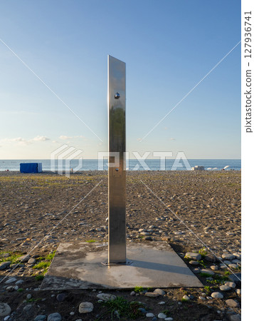 Shower on the beach. Modern shower outside. Resort by the sea. Shower on the beach. Modern shower outside. Resort by the sea. 127936741