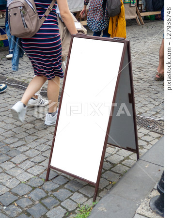 Mockup on a board on the street. Restaurant menu mockup. Sign on the sidewalk. White space for text or picture. Mockup on a board on the street. Restaurant menu mockup. Sign on the sidewalk. White space for text or picture. 127936748