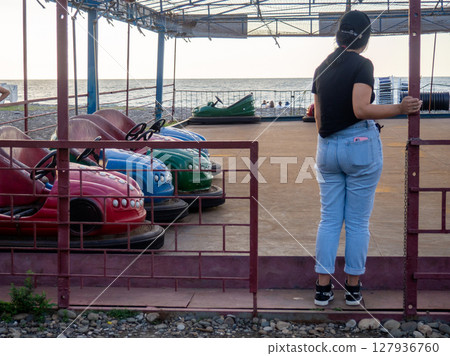 Amusement park. Autodrome. Entertainment concept. Carousel for children and adults. Thrilling sensations. Amusement park. Autodrome. Entertainment concept. Carousel for children and adults. Thrilling sensations. 127936760