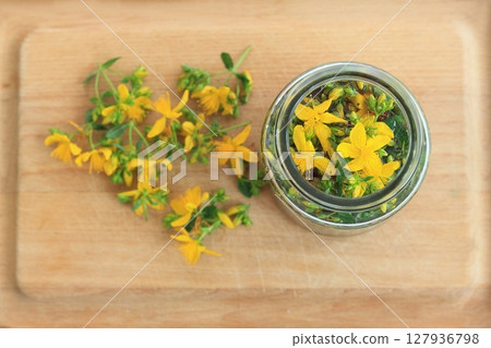 Tincture from Hypericum perforatum commonly known as St John's wort. Tincture from Hypericum perforatum commonly known as St John's wort. 127936798