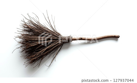 Rustic broom with natural bristles on a white background 127937044