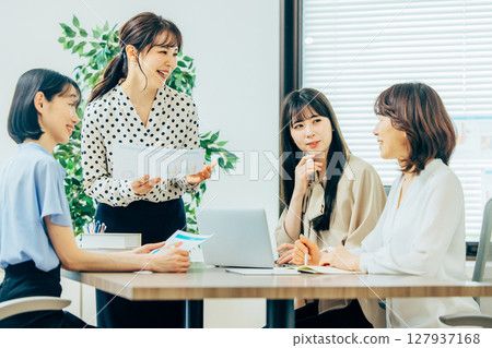Women who hold meetings Women who hold meetings 127937168