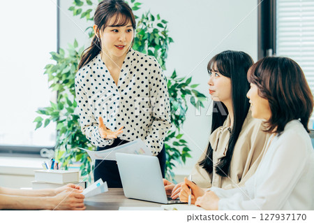 Women who hold meetings Women who hold meetings 127937170