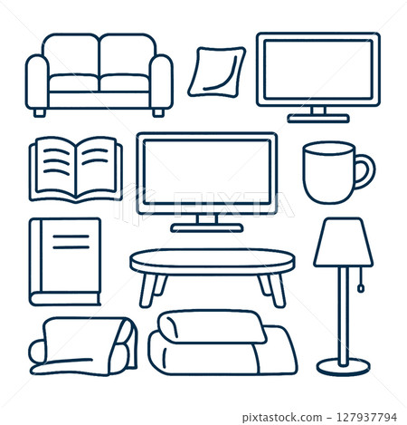 Cozy living room elements including sofa, pillows, books, and lamp create warm atmosphere 127937794
