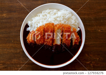 Katsu curry (black curry) on a table background viewed from directly above 127938276