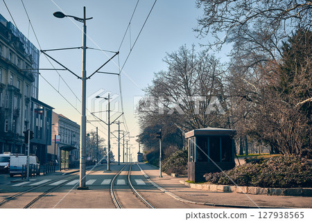 Empty tram track on quiet city street in winter 127938565
