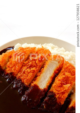 Katsu curry (black curry) on a white background Katsu curry (black curry) on a white background 127938621