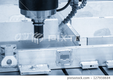 The CNC milling machine hole drilling at the aluminum battery frame parts by drilling tool in the light blue scene. 127938684