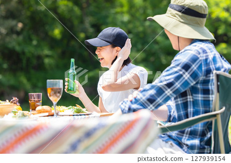 Friends who enjoy camping Friends who enjoy camping 127939154