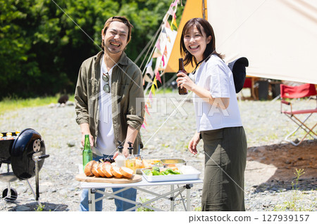 Friends who enjoy camping 127939157