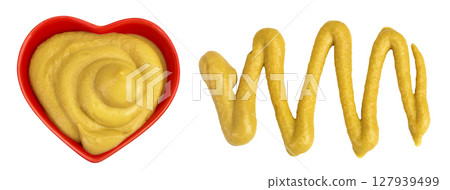 Mustard sauce in ceramic bowl with seed isolated on white background. Top view. Flat lay 127939499