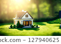 A miniature house on the lawn 127940625