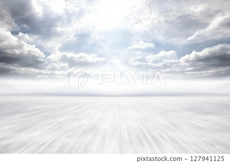 White Wooden Floor Extends Towards Cloudy Sky with Dreamlike Atmosphere. 127941125