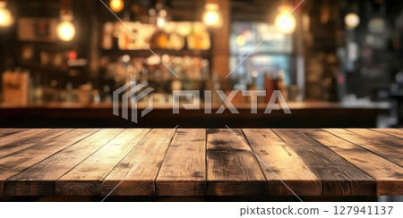 Empty Wooden Table Presents Blurred Cafe Background with Warm Lighting Decoration and Rustic Charm. Empty Wooden Table Presents Blurred Cafe Background with Warm Lighting Decoration and Rustic Charm. 127941137