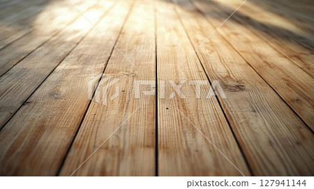 Sunlight Illuminates Wooden Floor Boards, Creating Warm Ambiance, Rustic Charm. 127941144