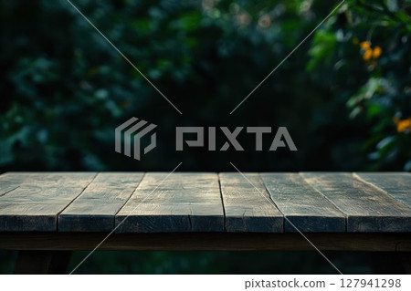 Empty Wooden Table Shows Rustic Charm with Lush Green Garden Background, Perfect for Display or Product Placement, Outdoor Living. 127941298