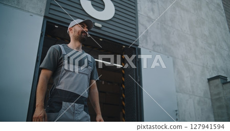 Outside of Logistics Retail Warehouse: Diverse Employees Loading Cardboard Boxes, Parcels 127941594