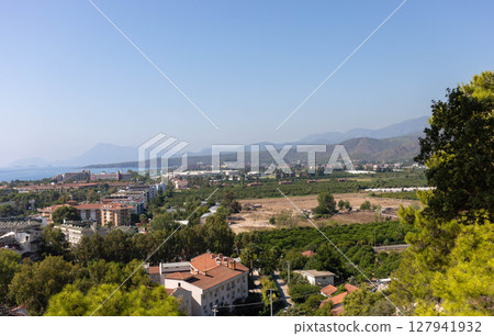 Kirish, Turkey - August 31, 2021 Scenic view of coastal landscape with mountains, urban development Kirish, Turkey - August 31, 2021 Scenic view of coastal landscape with mountains, urban development 127941932