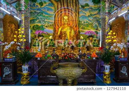 Golden Buddha Altar with Offerings and Floral Decorations at Linh Phuoc Pagoda, Da Lat, Vietnam 127942110
