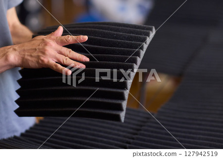 Installation of Acoustic Foam Panels is essential for effective Soundproofing in various settings 127942519