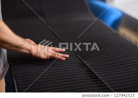 Installation of Acoustic Foam Panels is essential for effective Soundproofing in various settings 127942523