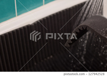 Waterproof Acoustic Foam Panel Designed for Use in a Shower Setting to Enhance Sound Waterproof Acoustic Foam Panel Designed for Use in a Shower Setting to Enhance Sound 127942528