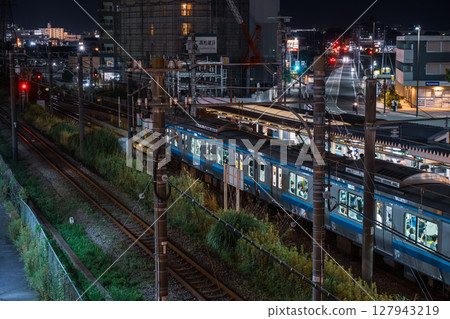 JR Sagami Line at night: A train bound for Chigasaki stopped at Ebina Station 127943219