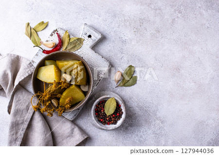 Bowl of pickled marinated cucumbers Bowl of pickled marinated cucumbers 127944036
