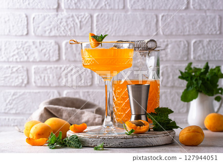 Fresh apricot Bellini cocktail with mint 127944051