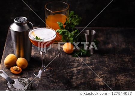 Fresh apricot cocktail martini with mint 127944057