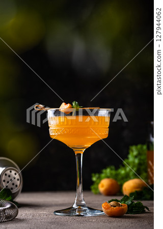 Fresh apricot Bellini cocktail with mint 127944062