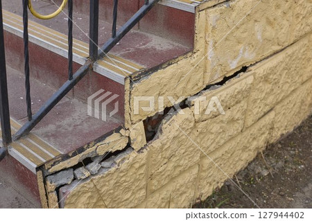 Damaged Structure Requires Urgent Repair Work 127944402
