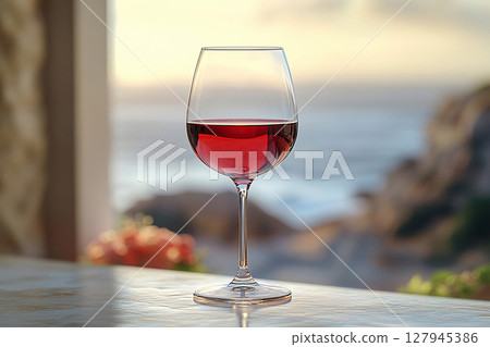 Luxurious drinking. Elegant Wine Glass filled with red wine. Mockup for wine industry branding. Luxurious drinking. Elegant Wine Glass filled with red wine. Mockup for wine industry branding. 127945386