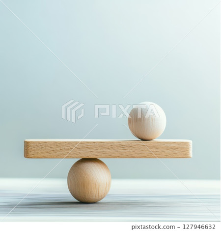 Wooden scale shows stability and movement 127946632