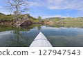 spring kayaking or canoeing on calm Horsetooth Reservoir near Fort Collins, Colorado - POV paddler perspective 127947543
